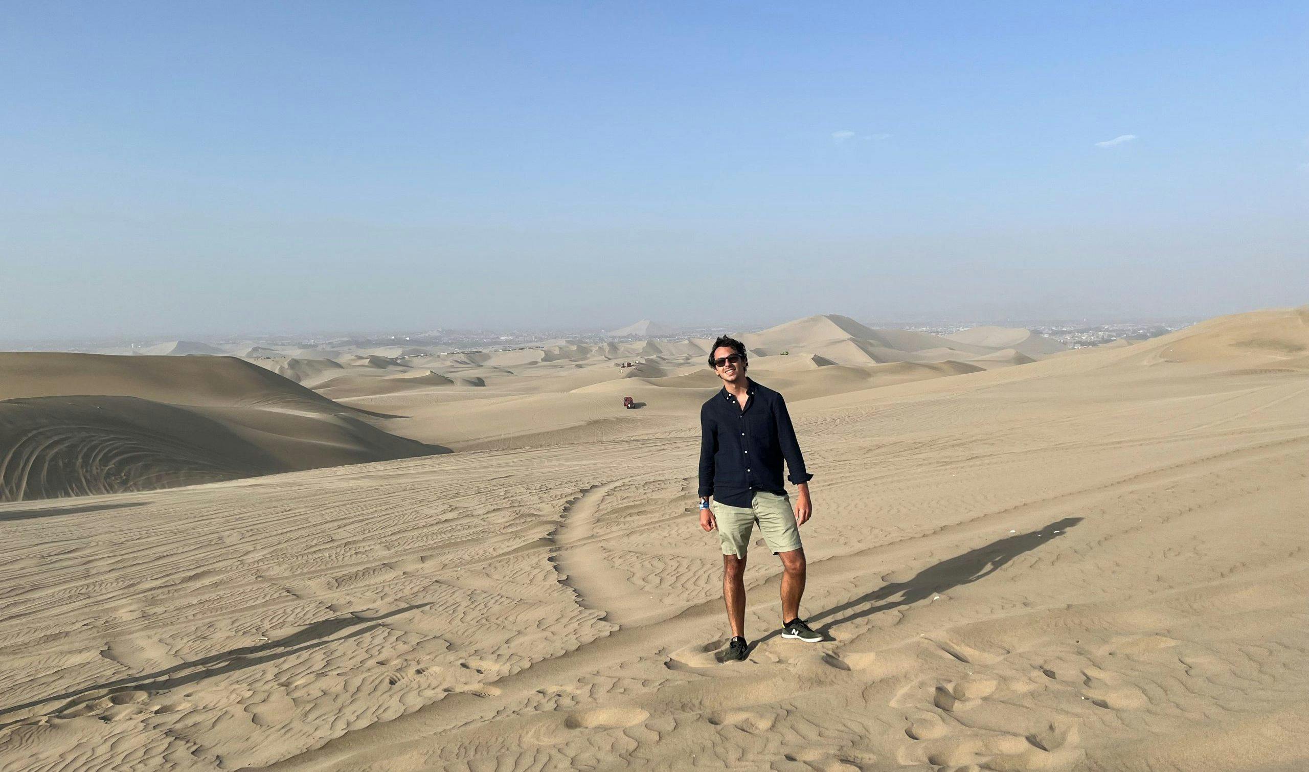 Photo of Batuhan Er standing in the desert